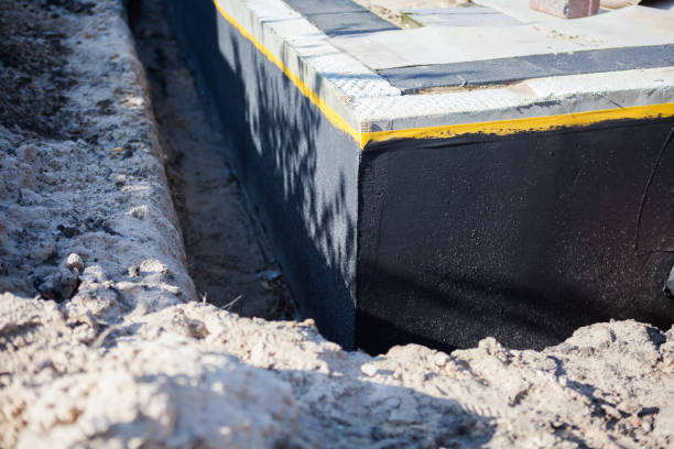 Professional Waterproofing technician working in Lancing, TN